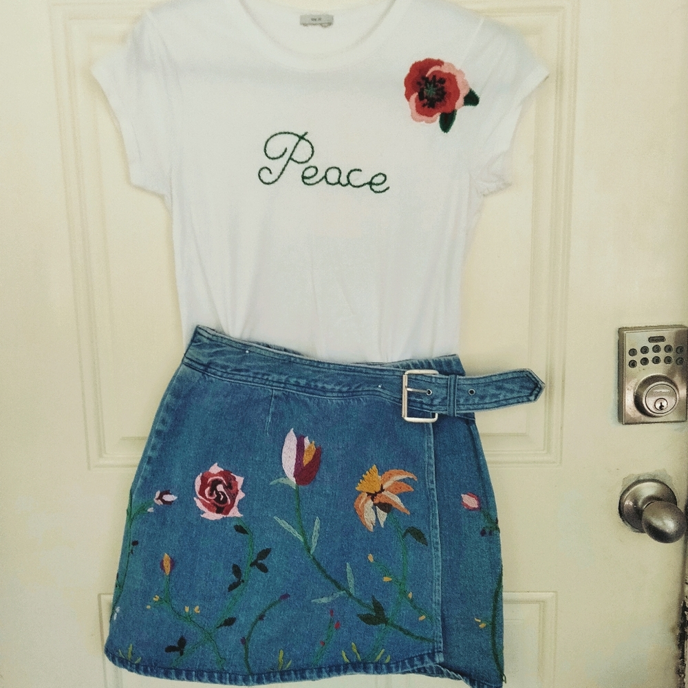 Embroidered tee and denim wrap mini skirt.